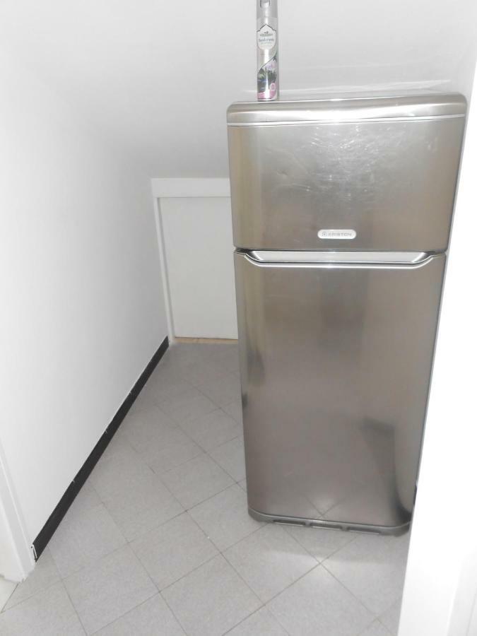 La Mansardina Apartment Vezzi Portio Bagian luar foto